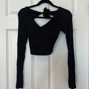 Black open back crop top with Ties. Never worn